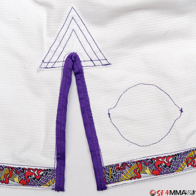 Shoyoroll Batch #8 White Mamba Gi, featuring a lightweight 450 GSM pearl weave jacket and 12 oz ripstop pants. Designed by artist John Smalls, this gi showcases a white base with purple trim. Released as part of the East vs. West Series on December 22, 2010, at 3:00 PM PST.